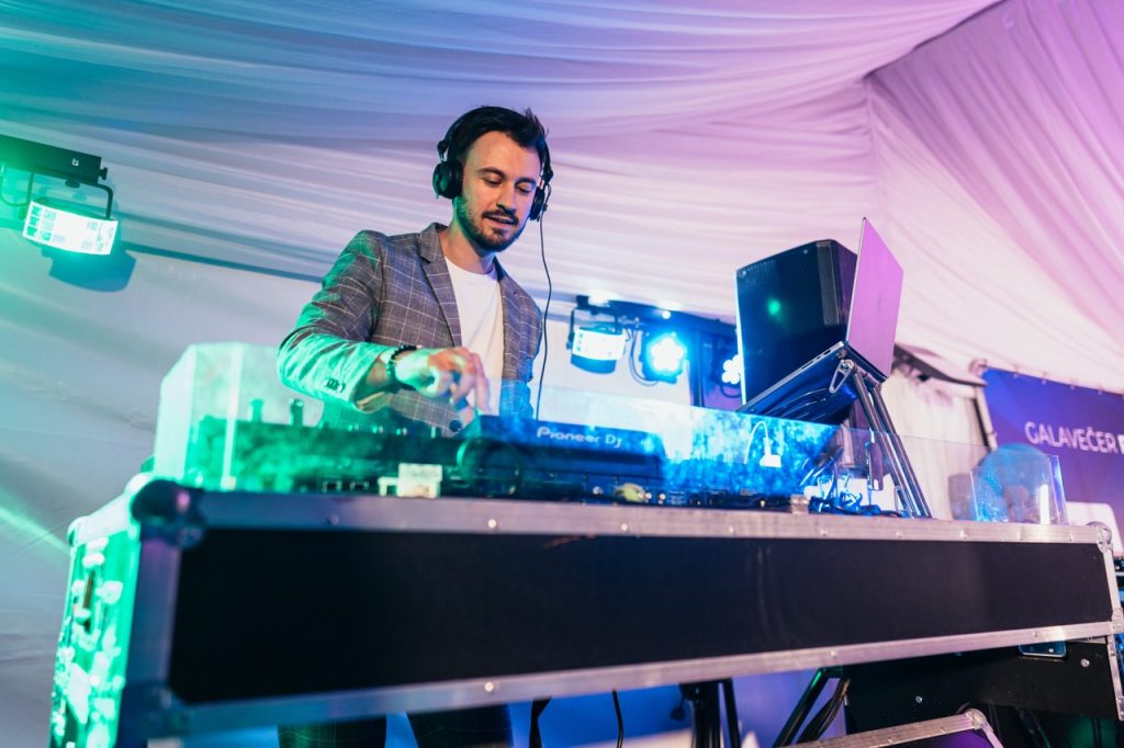 DJ Bury providing music at the Raildays trade fair in Ostrava, DJ booth in a tent