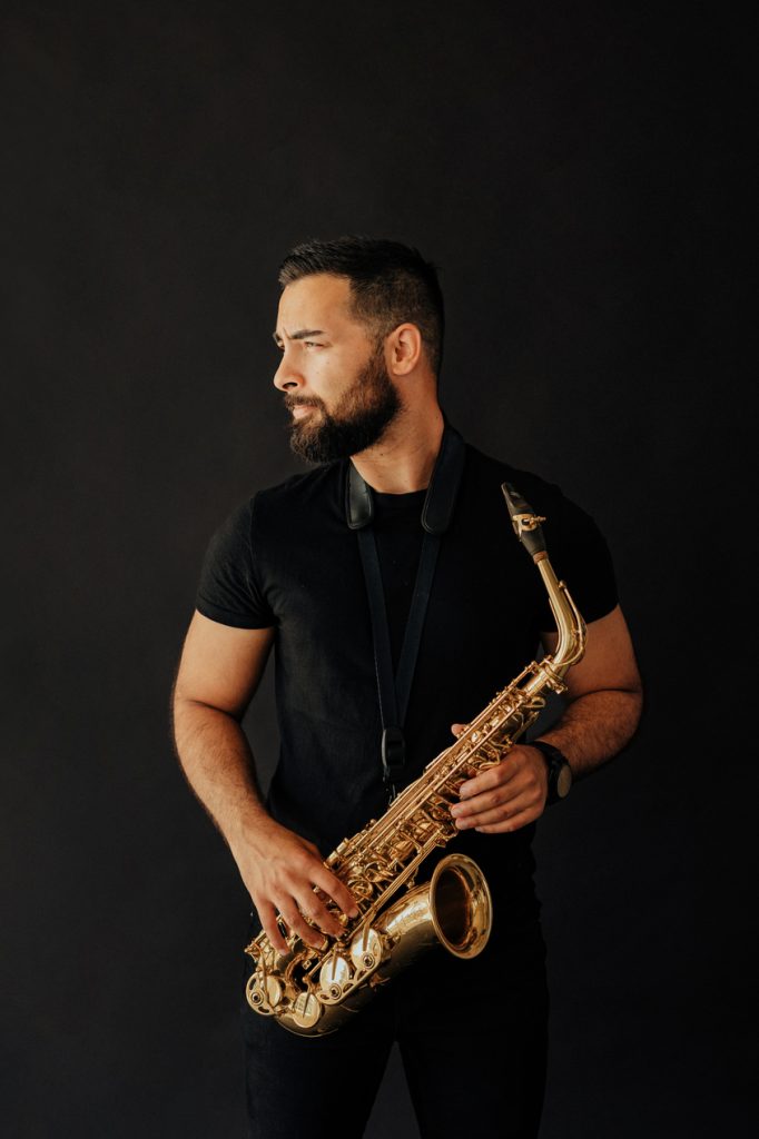 Saxophonist Johny Sax with an alto saxophone – BURYSAX promo photo
